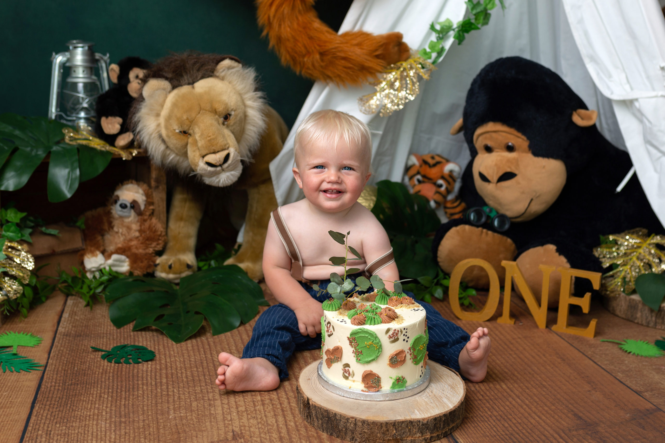 baby first birthday cake smash with a jungle theme at the studio in sompting